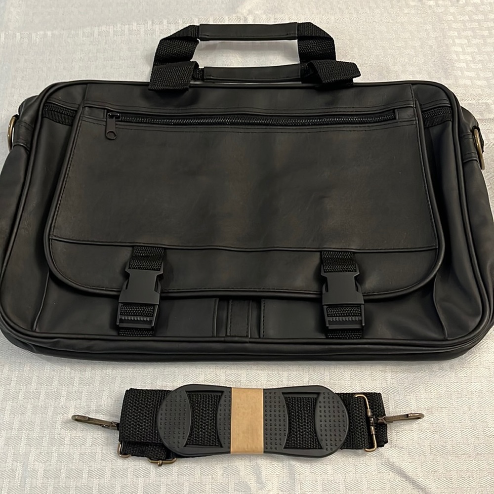Briefcase, Black, Handles and Shoulder Straps lots of storage.